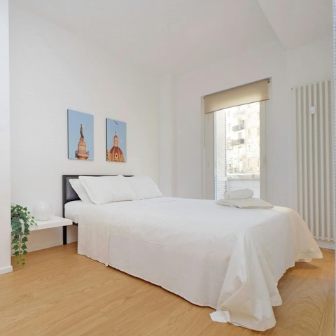 Open up the bedroom balcony doors and let the fresh air in