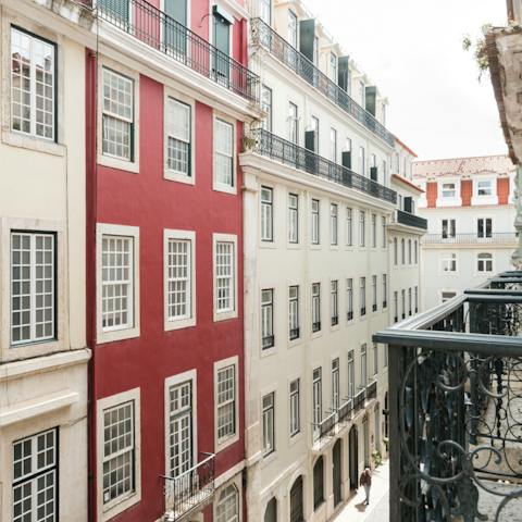 Take in the views over the neighbourhood from the balcony