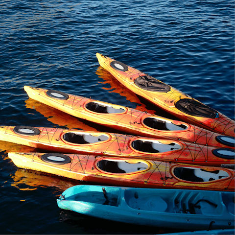 Kayak through the calm blue waters