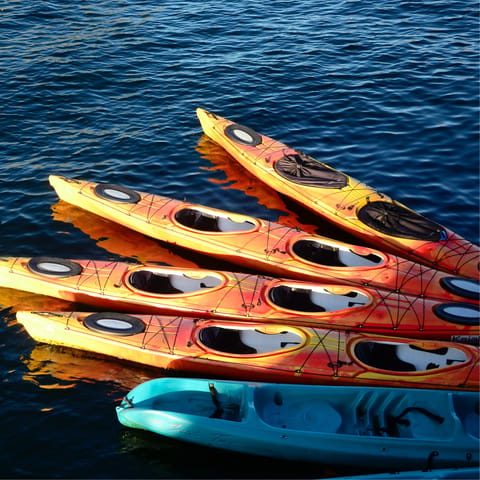 Kayak through the calm blue waters