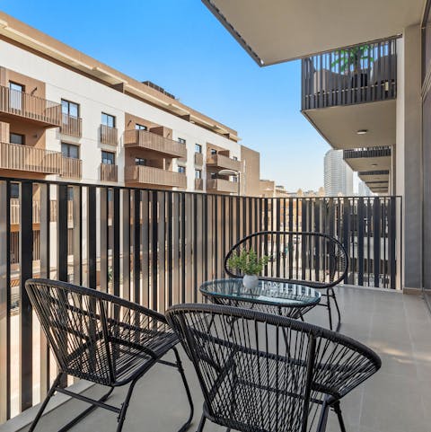 Sip a glass of something chilled on the private balcony