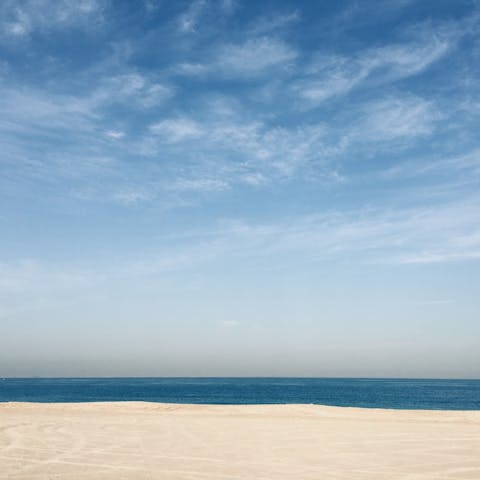 Spend an afternoon soaking up the golden sunshine on Sufouh Beach