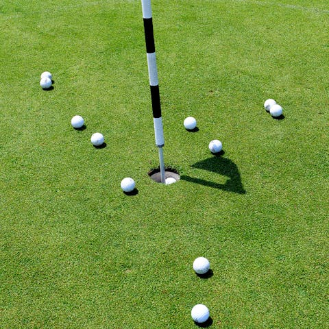 Play a round of golf at the nearby course