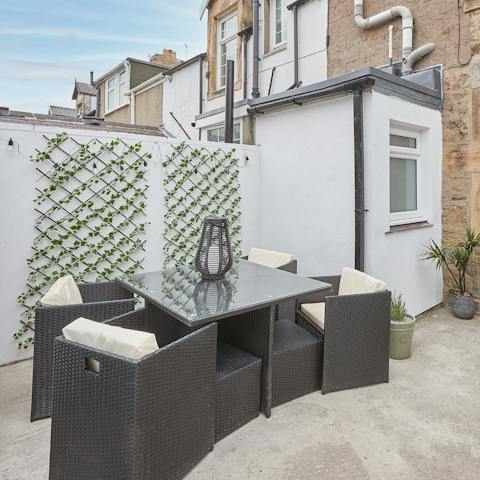 Relax in the sun and dine alfresco on the furnished patio