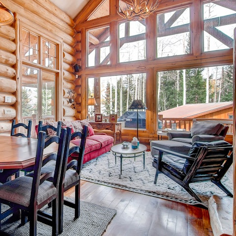 Take in the mountain scenery through floor-to-ceiling windows