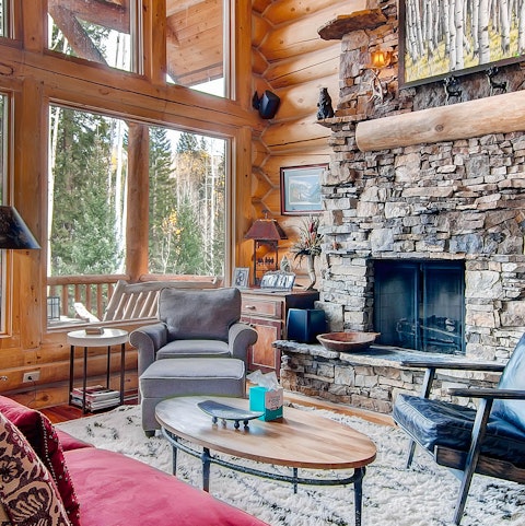 Curl up with a book beside the large stone hearth