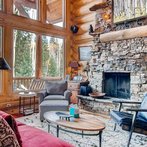 Curl up with a book beside the large stone hearth
