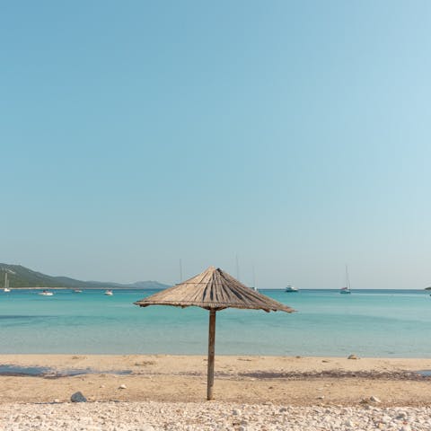 Walk ten minutes to the soft sand of Kalathas beach