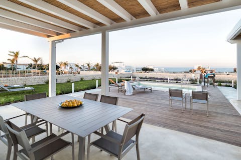 Share dinner with your loved ones on the outdoor terrace, accompanied by the view