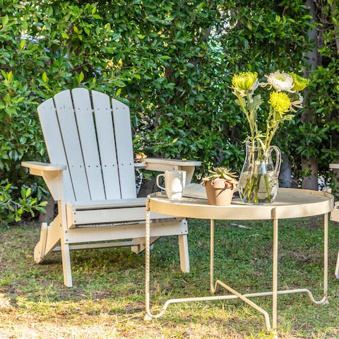 Sip your morning coffee in the verdant garden