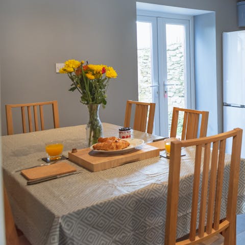 Tuck into hearty English breakfasts around your quaint dining set