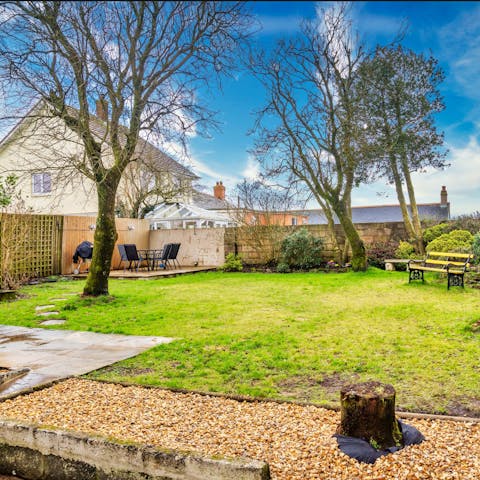 Relax in the fresh air in your large garden, where kids and dogs can let off steam