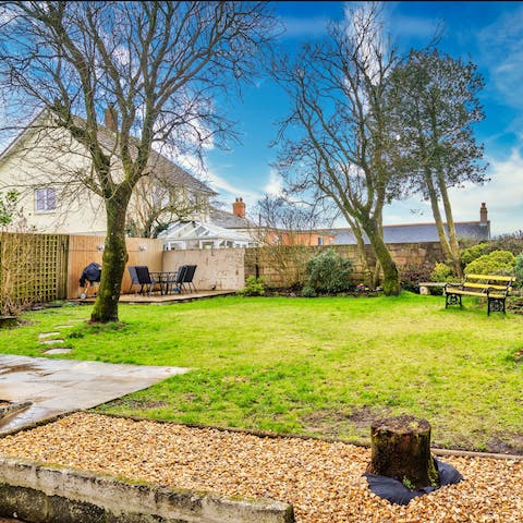 Relax in the fresh air in your large garden, where kids and dogs can let off steam