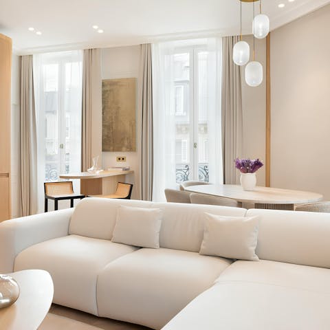 Stretch out in the spacious lounge after lots of steps and sightseeing