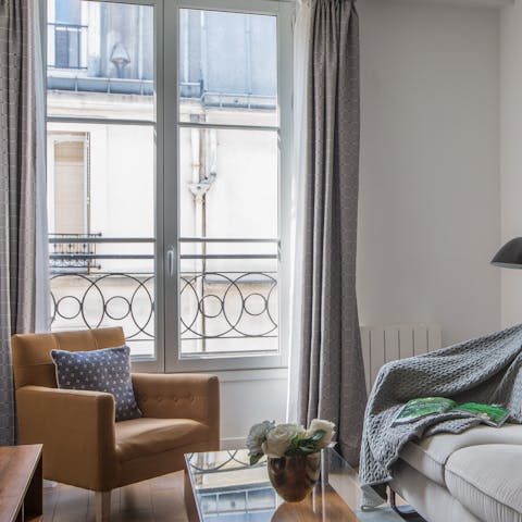 Sip a glass of wine at the window seat as you peer over the balcony