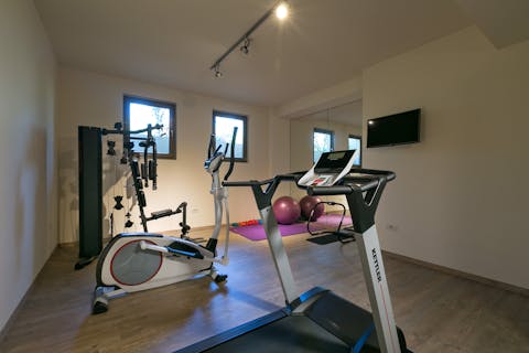 Stay on top of your fitness routine with a workout in the gym
