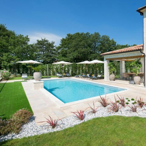 Take a dip in the pool or laze in the sun on a lounger