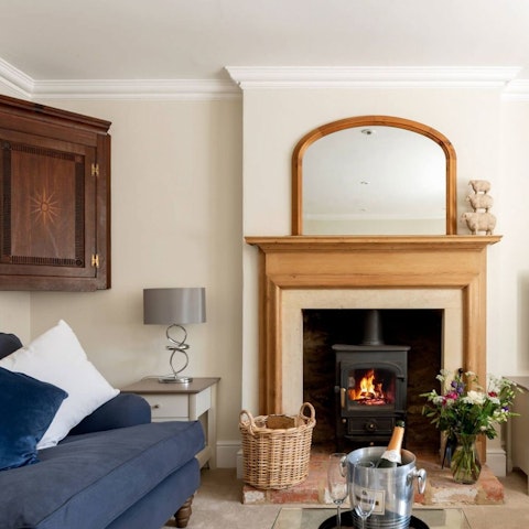 Spend chilly evenings getting cosy by the fireplace