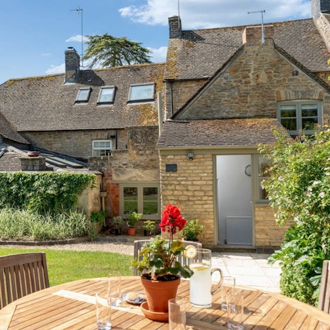 Enjoy an alfresco tipple in the sun-kissed garden