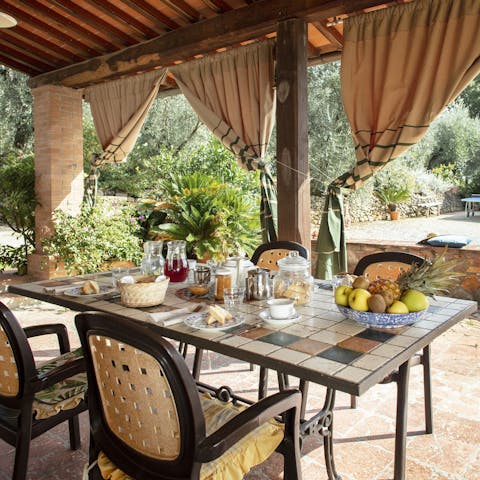 Start the day with breakfast on the covered terrace