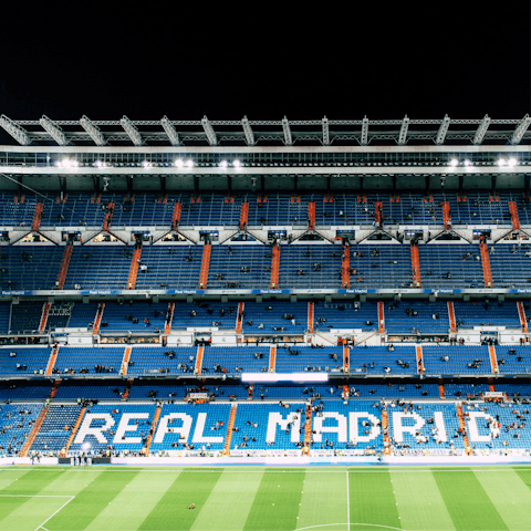 Catch a game at Santiago Bernabéu Stadium, a fifteen-minute walk away