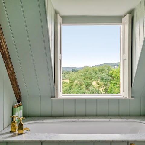 Unwind with a soak in the bat, backdropped by sensational views