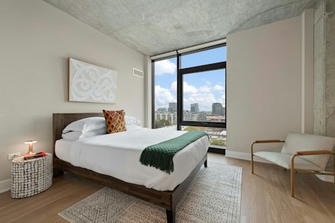 Wake to Chicago skyline views from the comfortable bedrooms