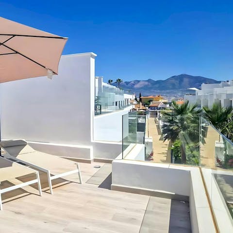 Relax and unwind with drinks on the private roof terrace