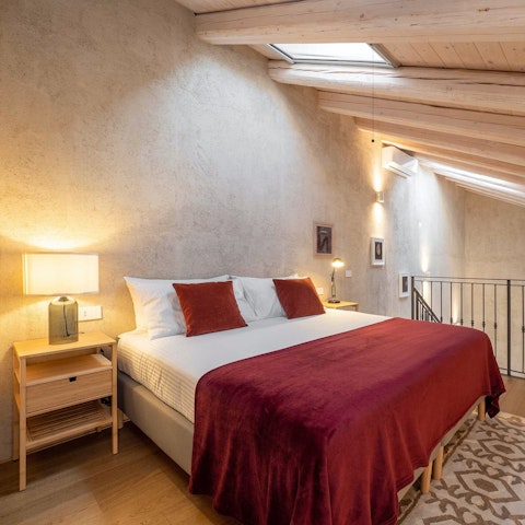 Head up to the mezzanine bedroom to sleep off all the fun