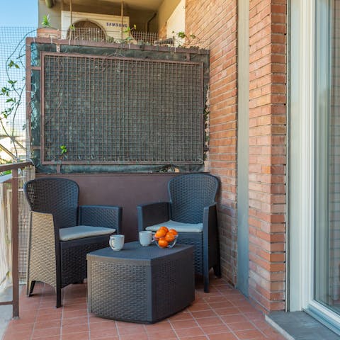 Enjoy your morning coffee on the private balcony