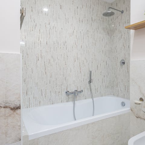 Soak in the bath after a long day of sightseeing