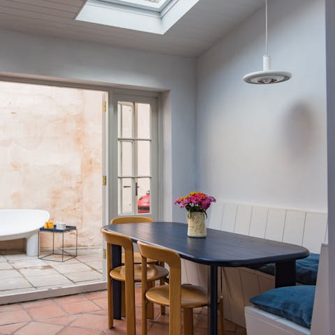 Come together for memorable mealtimes in the light-filled dining nook