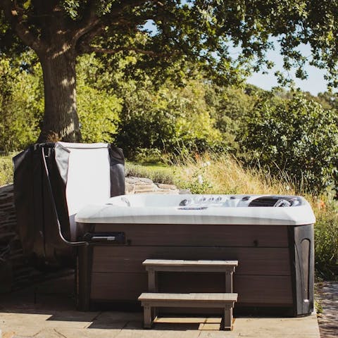 Embrace total relaxation while soaking in the hot tub