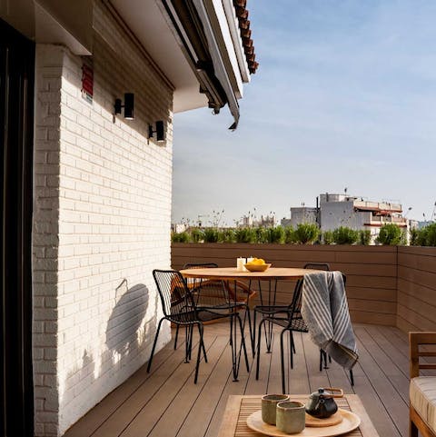 Have breakfast against terrace views of the Sagrada Familia