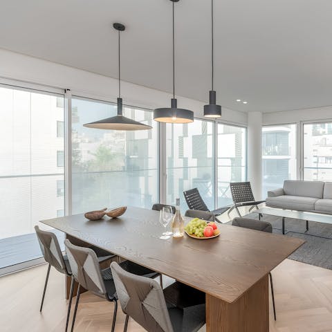 Pick up nibbles from Carmel Market for drinks back home