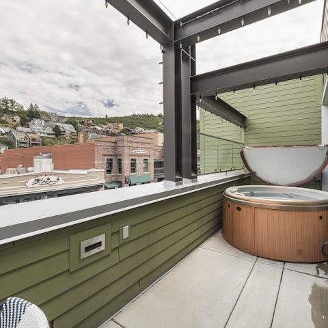 Admire the  gorgeous views as you soak in the hot tub
