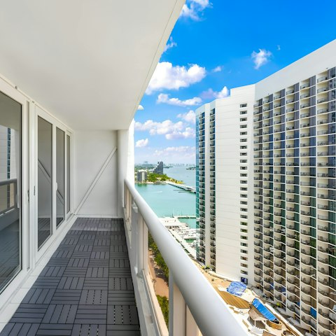 Spy Biscayne Bay from your private balcony