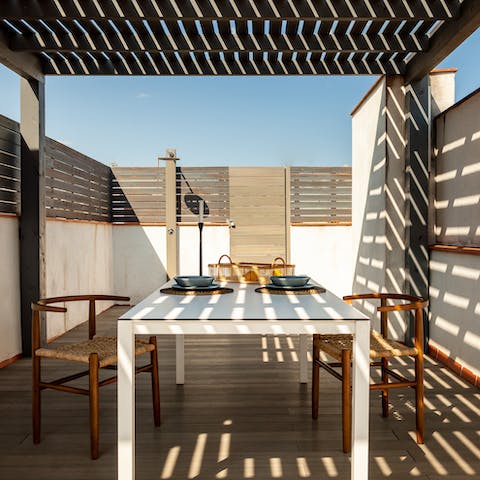 Enjoy an alfresco meal on the shaded communal terrace or cool down from the heat under the outdoor shower