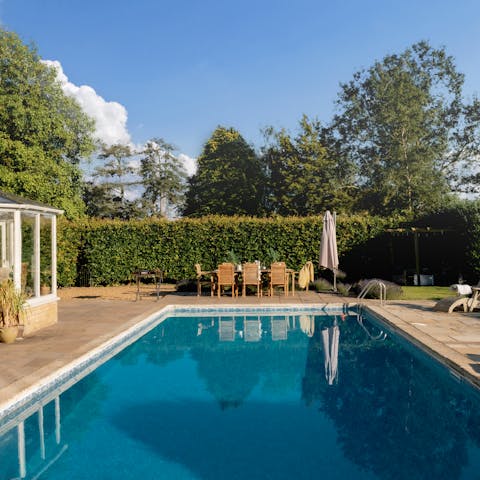 Go for a dip in the heated swimming pool