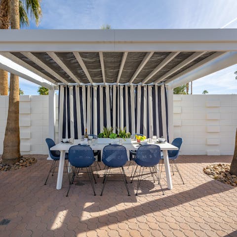 Dine alfresco under the shade of the pergola