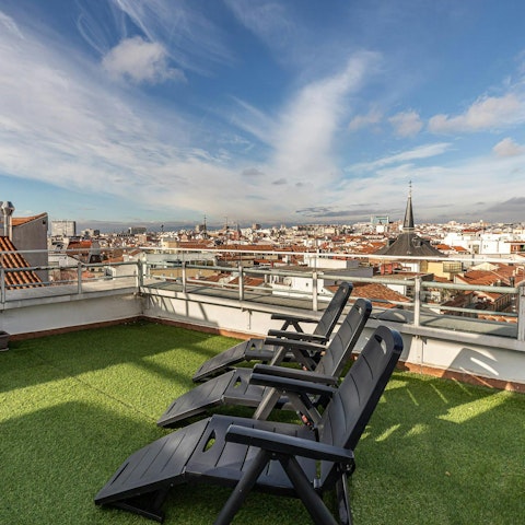Enjoy the views on the shared rooftop terrace