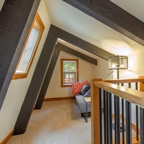 Cosy yourself away with a good book in the loft's reading corner