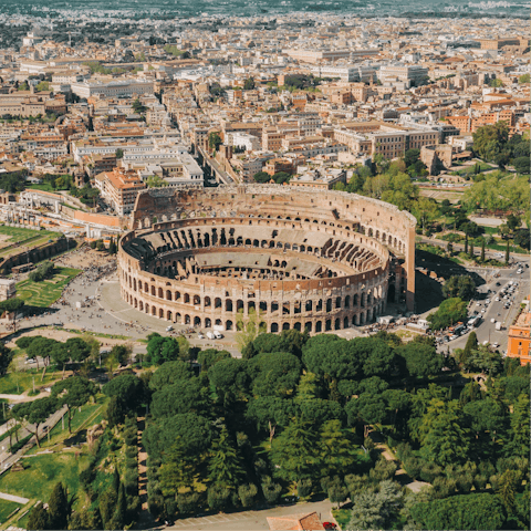 Begin your Roman holiday at the Colosseum – a short bus ride away
