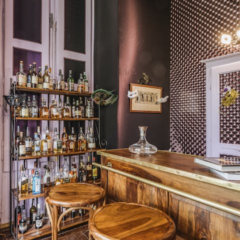 Have a drink in the fully stocked cocktail room
