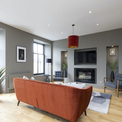 Snuggle up for a cosy evening in the stylish living room