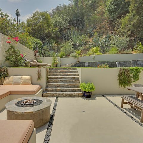 Dine outdoors overlooking lush hills