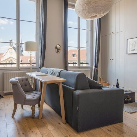 Catch a glimpse of the Eiffel Tower from the huge windows – the famous tower is a thirty minute walk away