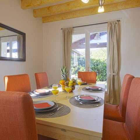 Gather around the dining table to enjoy a delicious home-cooked meal