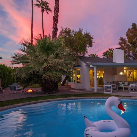 Take a dip in the pool as the sun goes down