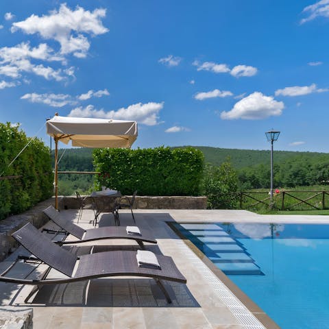 Bask in the sunshine whilst relaxing poolside with a good book